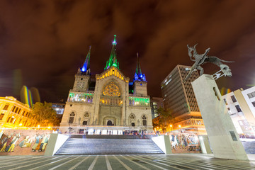 MANIZALES, COLOMBIA - JUNE 1: Central Bolivar Square with the neo-gothic Cathedral Basilica of Our Lady of the Rosary and Simon Bolivar statue at night on June 1, 2016 in Manizales, Colombia.