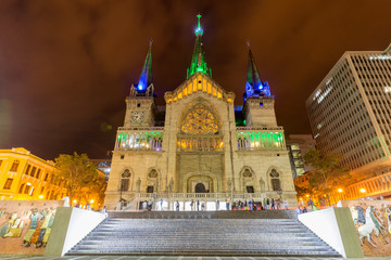 Fototapeta na wymiar MANIZALES, COLOMBIA - JUNE 1: Central Bolivar Square with the neo-gothic Cathedral Basilica of Our Lady of the Rosary at night on June 1, 2016 in Manizales, Colombia.