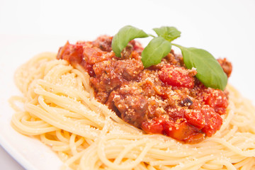Spaghetti bolognese on a white background