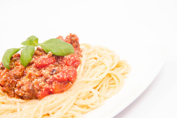 Spaghetti bolognese on a white background