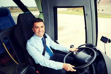 happy driver driving intercity bus