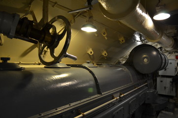 inside a torpedo room in a retired submarine