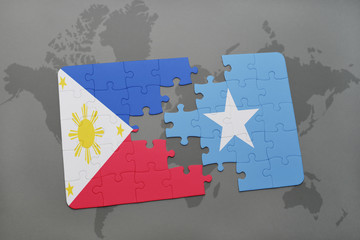 puzzle with the national flag of philippines and somalia on a world map