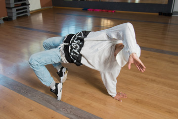 young modern style dancer is posing