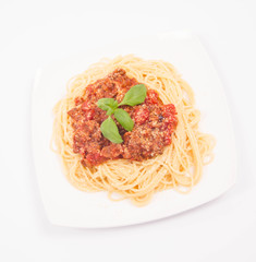 Spaghetti bolognese on a white background