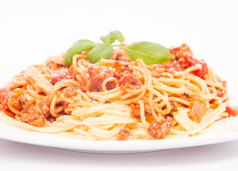 Spaghetti bolognese on a white background