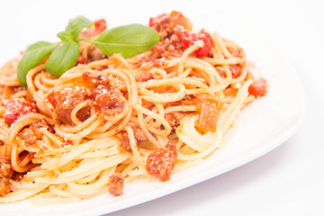 Spaghetti bolognese on a white background