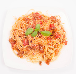 Spaghetti bolognese on a white background