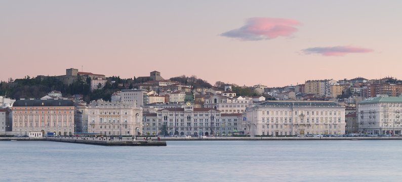 Piazza Unit&agrave; d'Italia square and the Molo Audace, view from the sea of Trieste, Italy