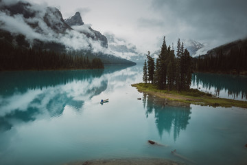 Canoeing near Spirit Island on Maligne Lake
