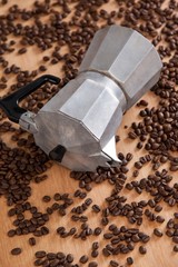 Metallic coffee maker with coffee beans