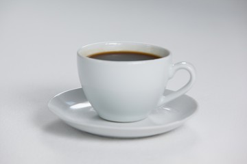 Obraz premium Black coffee served in white cup