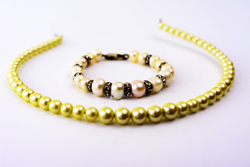 Women's jewelery and jewelery on a white background