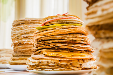 A stack of pancakes of different colors during the celebration Russian Shrovetide (pancake week)