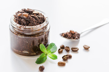 Organic spa with coffee scrub in cosmetic set on table