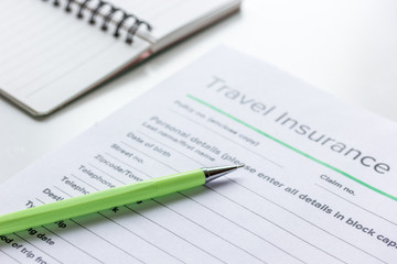 booking travel concept with insurance on table background