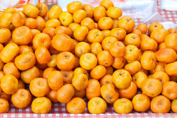 Pile of orange ready for sale in the market.