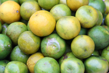 Pile of orange ready for sale in the market.