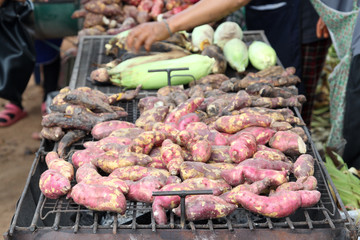 Sweet potato roasted on stove in the market.
