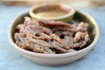 Thai food, deep fried pork with fish sauce.
