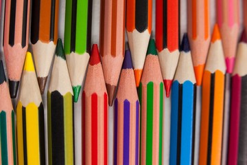 Colored pencils arranged in interlock pattern 