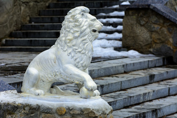 Statues and figurines in a park zone in the winter holiday Maslenitsa