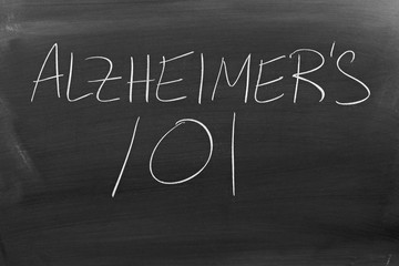 The words "Alzheimer's 101" on a blackboard in chalk