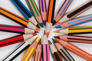 Fototapeta premium Close-up of colored pencils arranged in a circle