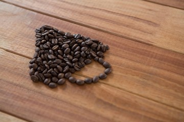 Coffee beans forming cup shape