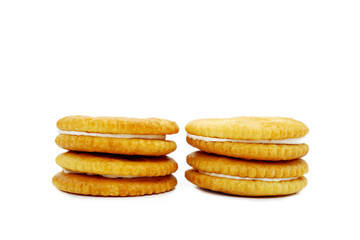 A stack of delicious wheat round biscuits with cream