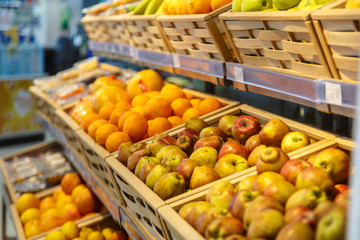 Shopping showcase in the supermarket with vegetables and fruit.
