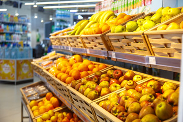 Shopping showcase in the supermarket with vegetables and fruit.