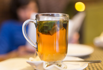 A glass of mint tea in a restaurant