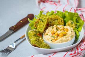 Bright green falafel with hummus. Love for a healthy vegan food concept