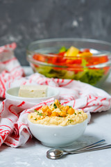 Vegan lunch: tofu, salad and hummus. Love for a healthy vegan food concept
