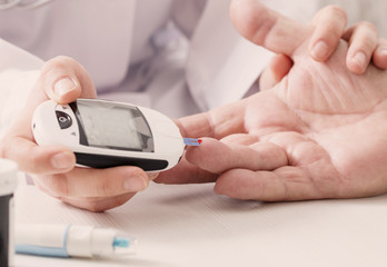 Fototapeta premium measuring blood sugar