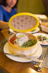 Fish with vegetables in a couple in a restaurant