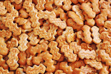 Cracker cookies with poppy seeds vertical background