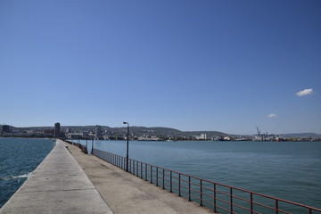 Fototapeta na wymiar marina and quay of Novorossiysk. Urban landscape of the port city