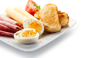 Breakfast - eggs, toast, ham and cheese