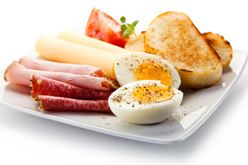 Breakfast - eggs, toast, ham and cheese