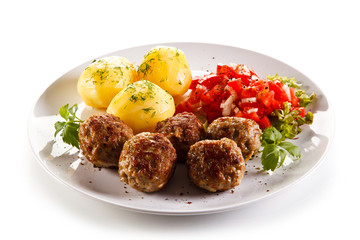 Roast meatballs with potatoes