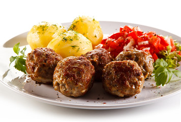Roast meatballs with potatoes