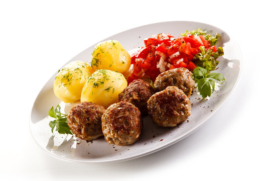 Roast meatballs with potatoes