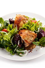 Roast chicken meat with vegetable salad
