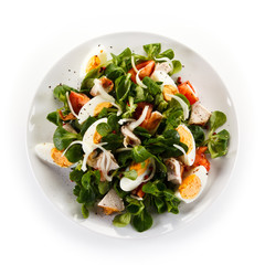 Salad with grilled chicken and boiled eggs