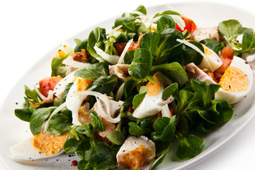 Salad with grilled chicken and boiled eggs