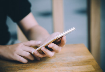 Young hipster woman using smartphone , online concept