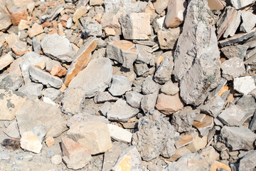Broken bricks on construction site as background