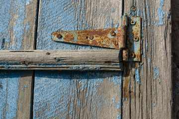 Old rusty door hinge